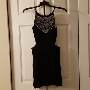 Black dress with white embroidery